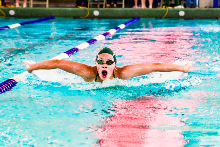 Wildcat swimmers fall 84-85 to Vikings